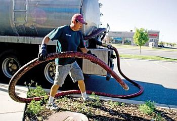 a grease trap cleanout in Kendall West