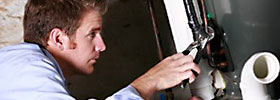 Mark, one of our plumbers is repairing a broken water heater